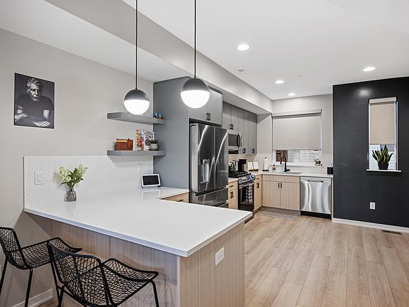 This kitchen is no ordinary kitchen. The fridge has a filtered water pitcher that refills itself, the dishwasher opens automatically when it finishes a cycle, & G00gle Home can be your personal assistant to help plan your day and play the best tunes!