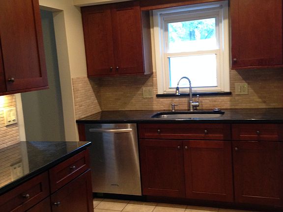 Newer Kitchen with top of line cherry cabinets, granite coun
