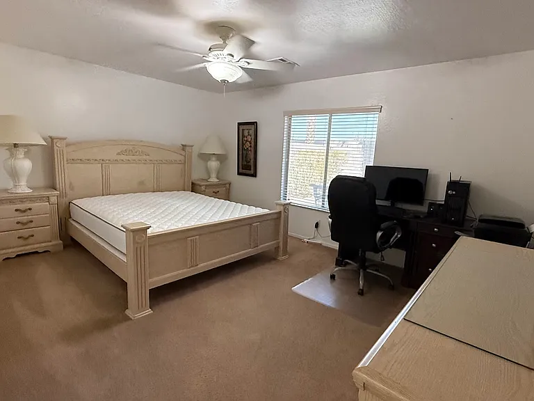 Master Bedroom has beautiful views of backyard and very large.