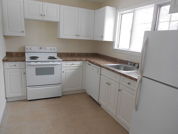 new cabinets, counter, tile floor