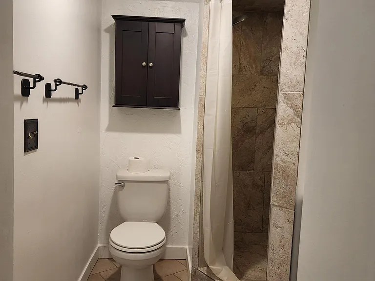Bedroom 1 bath with shower.