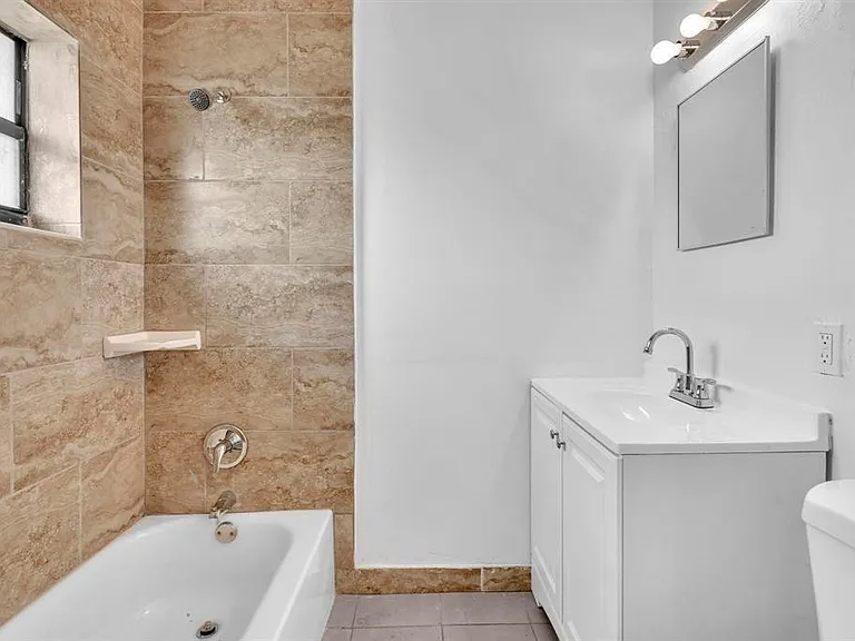 5748 NW 27th Ct — Photo 12