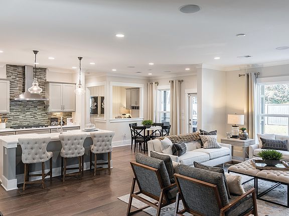 Enjoy the open floorplan concept ideal for entertaining. - Model Representation