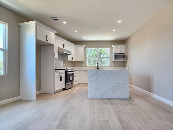 Kitchen with Waterfall Island