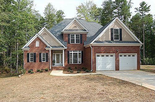 Picturesque setting on a private, wooded lot.