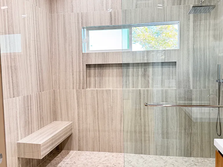 Bedroom 2 Private Bath - Walk-in standing shower with built in bench.