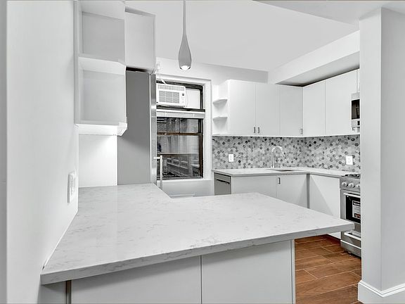 3rd image of 226 E 12th St APT 1J