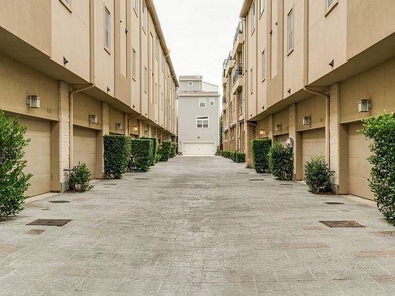 Townhomes are now painted grey and white!