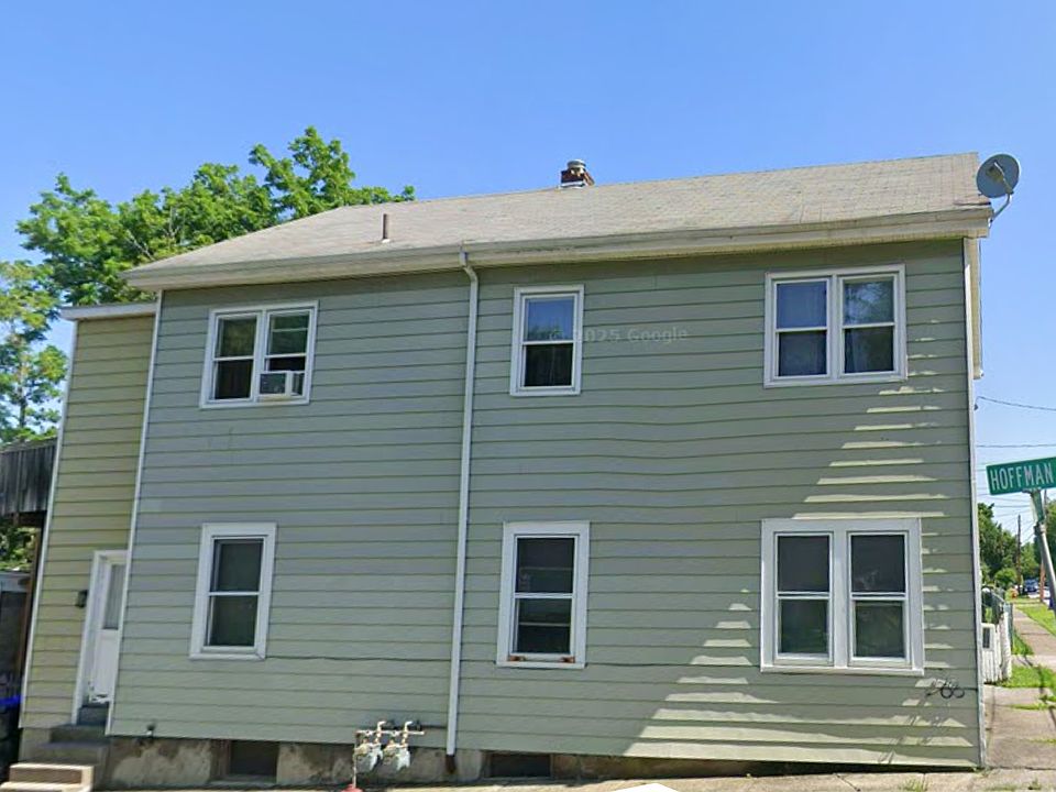 Welcome to your future home. This charming front view sits gracefully on a sunny corner.