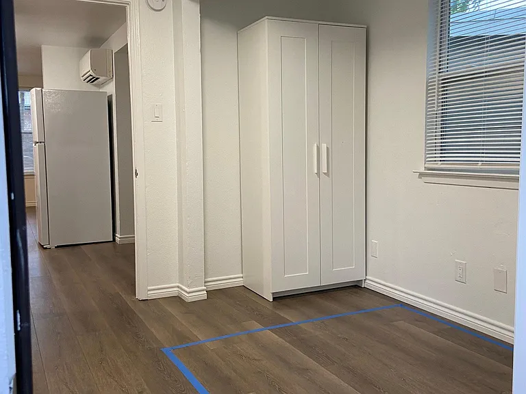 Compact bedroom with moveable 30" wardrobe or space for 45" wide dresser