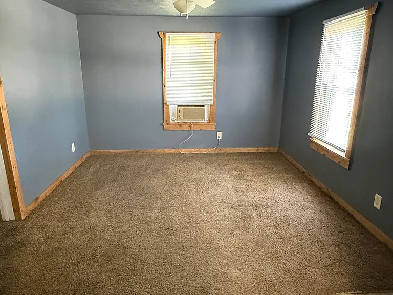 Living Room w/ AC Unit