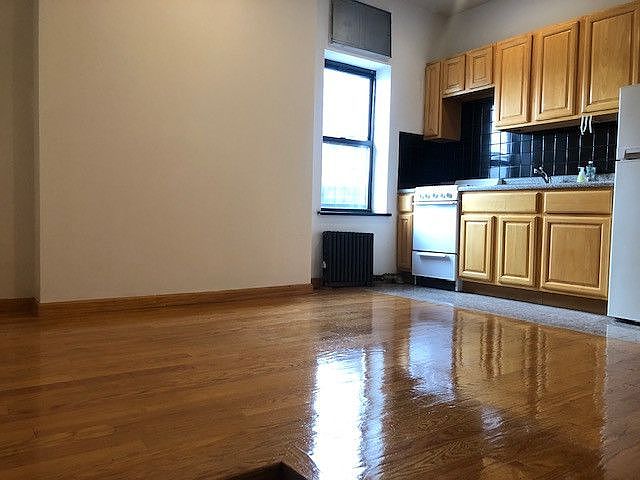 1st image of 120 E 1st St APT 12