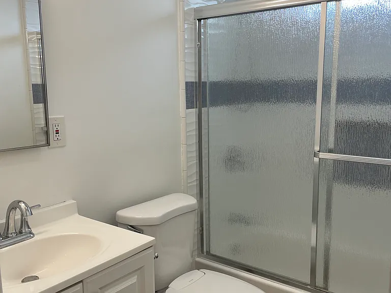 Enclosed shower/tub combination