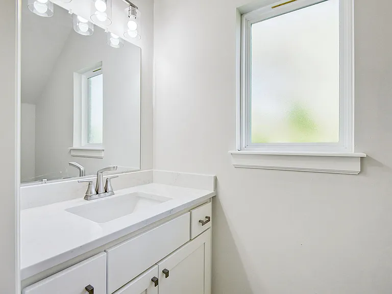 Downstairs powder bath for guests.