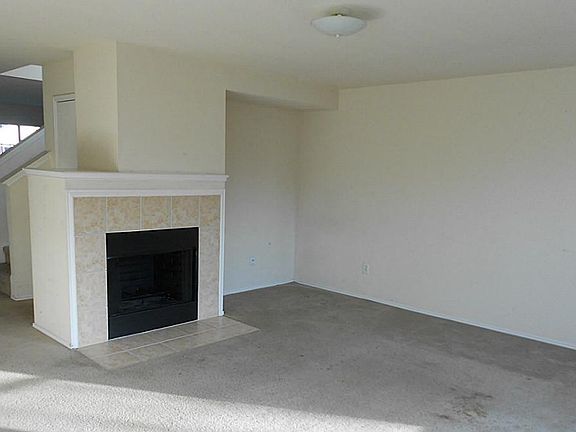Family room with wood burning fire place