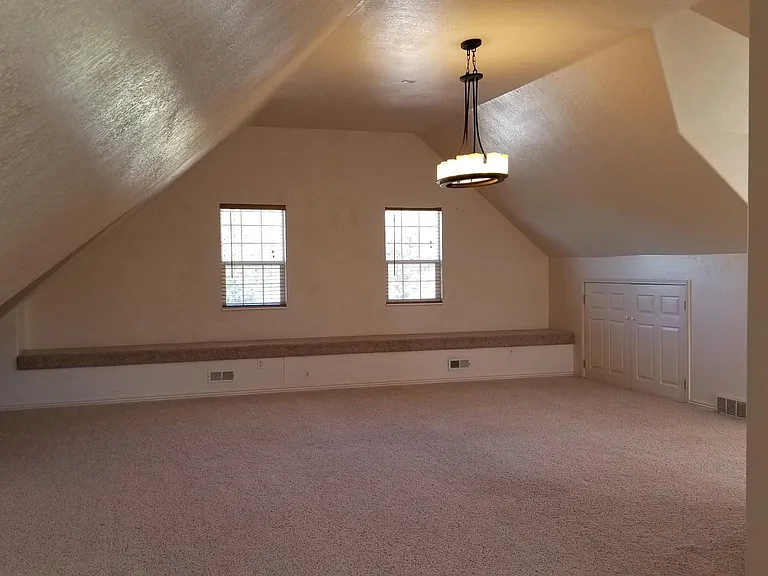 Another view of third floor bonus room. All windows have beautiful views of mountains!