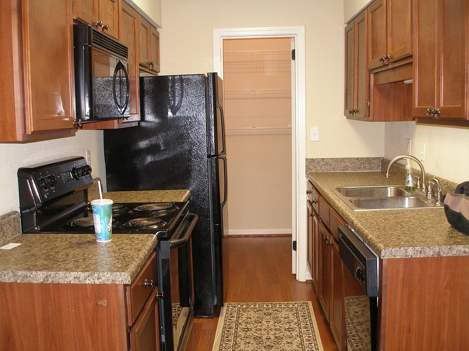 Kitchen with walk-in pantry.