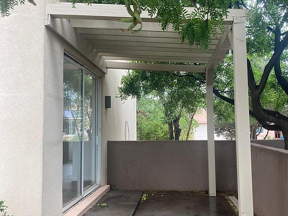 Back patio with shade tree.
