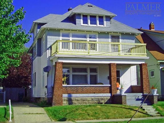 Front of home featuring the sun deck over the porch