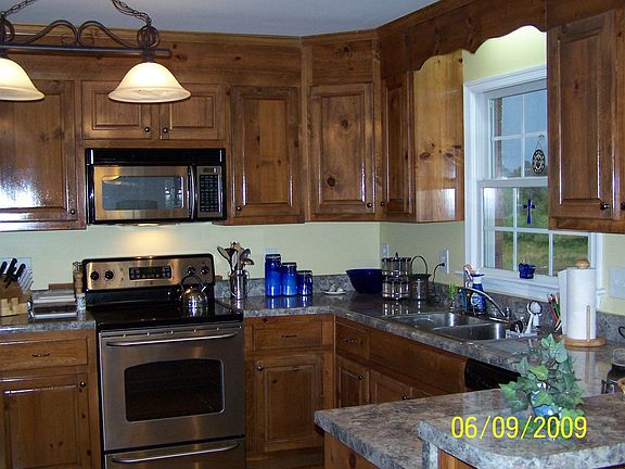 Kitchen with hardwood cabinetry