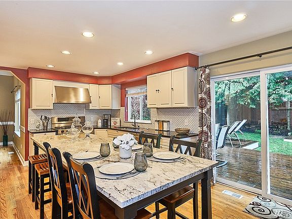 Gorgeous kitchen remodel with granite counters, tile backsplash