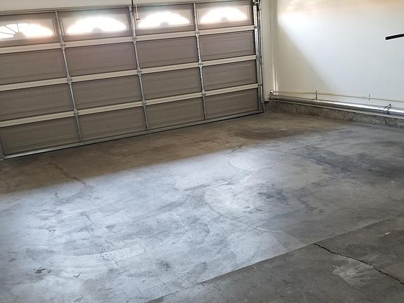 two car garage with opener and washer dryer hook ups