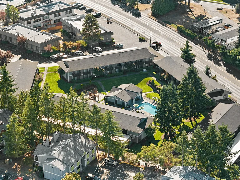 Your community hub, surrounded by greenery and thoughtful outdoor spaces.