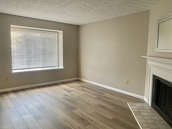 New 2" white wood blinds, freshly painted and new white trim!