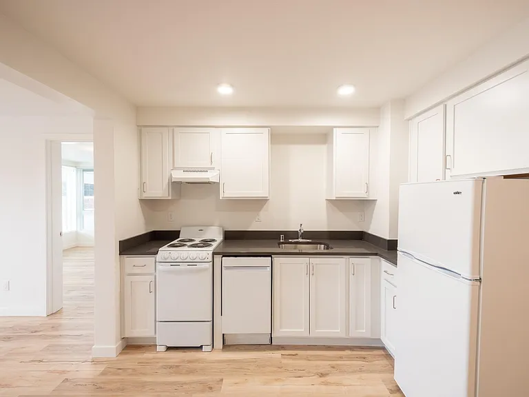 Kitchen area in one bedroom with ample cabinet space