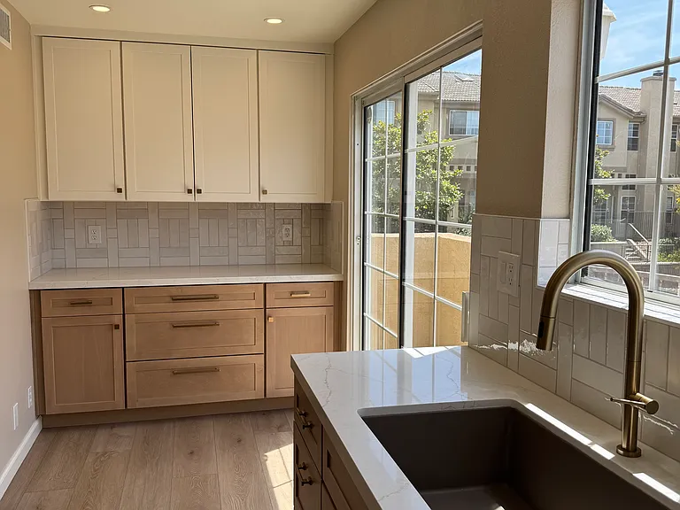 Kitchen has access to private balcony