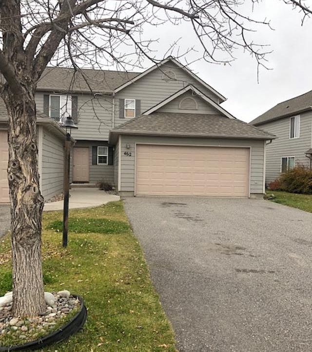 Front of unit with oversize garage detached