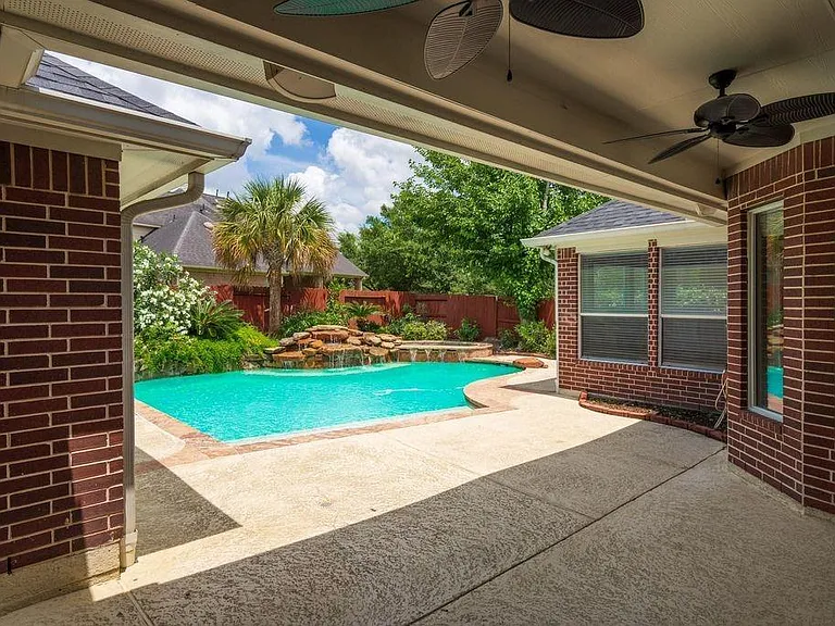 12406 Santiago Cove Ln — Photo 33