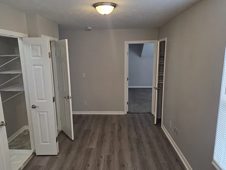 2nd floor loft with laundry room and linen closets