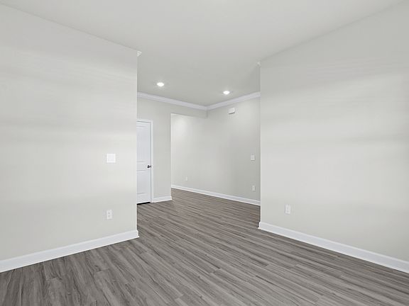 The foyer opens up to a flex space or home office.