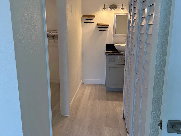 Hallway leading to master bath and closet