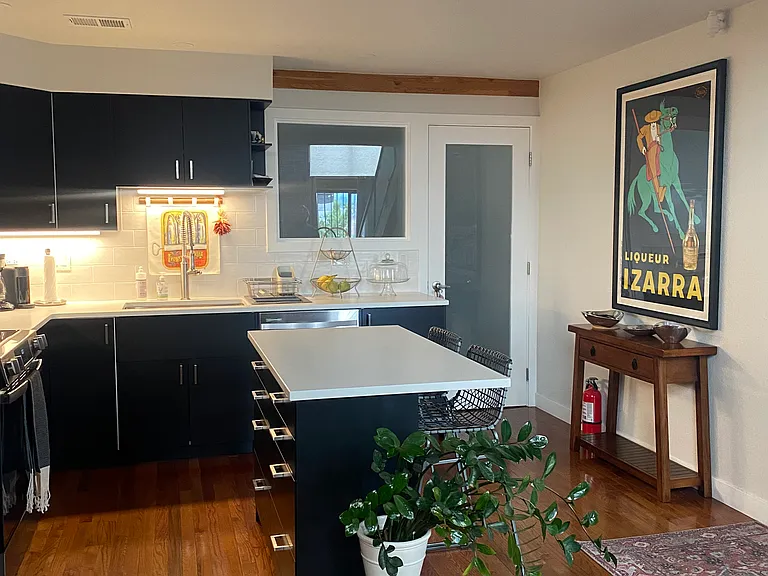 Kitchen with door to the second bedroom