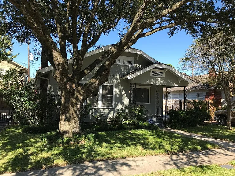 Front yard with huge Oak Tree