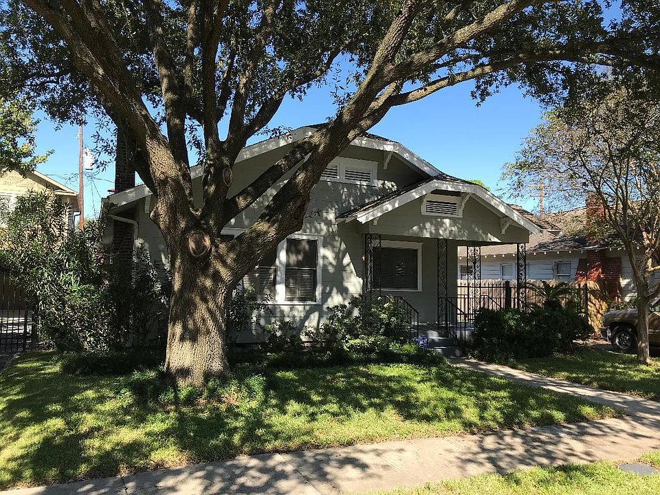Front yard with huge Oak Tree