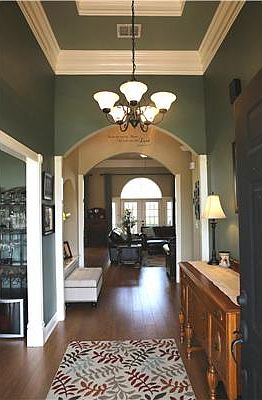 Inviting Entryway with Arched Doorways