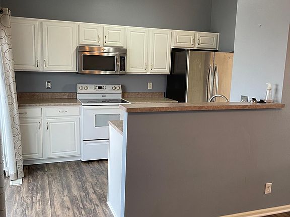 Kitchen has dishwasher and large pantry closet