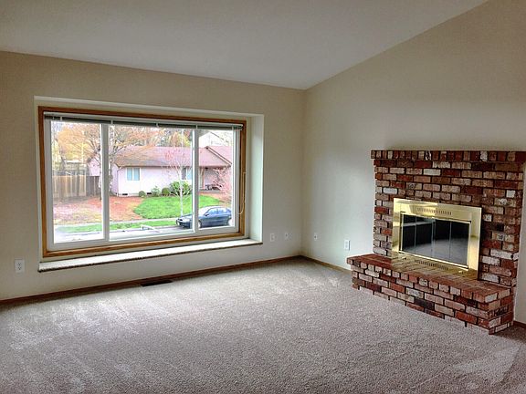 Living room with vaulted ceilings