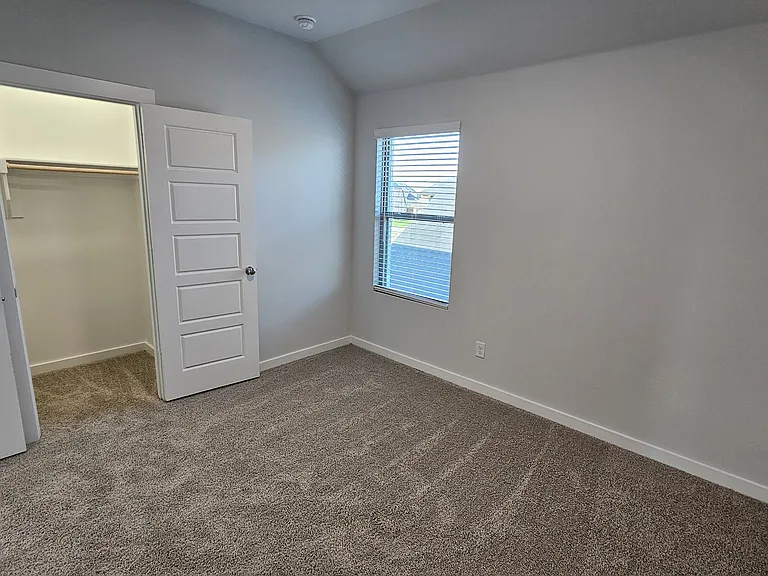 Quiet and comfortable upstairs bedroom, tucked away to provide a peaceful space for rest or study