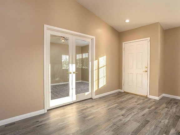 Interior of Front Door. First bedroom/office through double doors.