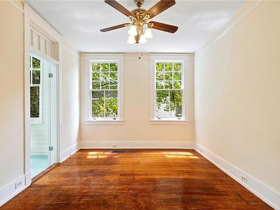 Bedroom with attached sunroom-office.