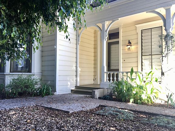 Front entry with porch and patio