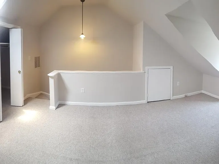 Loft bedroom area on third floor- wide angle