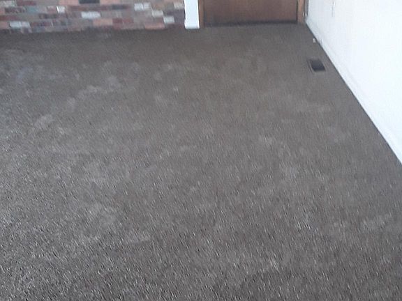 area across from entertainment center in front room