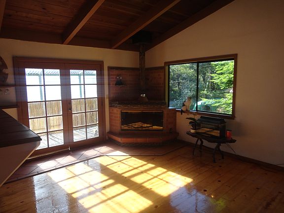 Living area facing fireplace