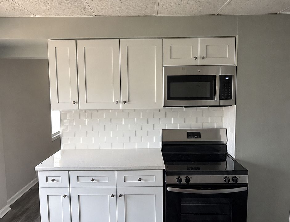 New kitchen cabinets, quartz countertops, and appliances