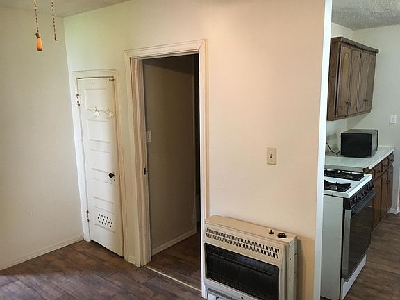 bathroom is adjacent to kitchen. Also wall gas heater for winter heat.